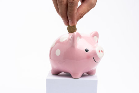Savings concept. Piggy bank on white backgroundの写真素材
