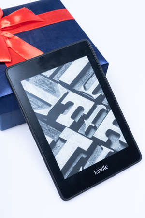 Kuala Lumpur, Malaysia - May 2021. Amazon Kindle Paperwhite 2019 is Amazon e-book reader that is lightweight and waterproofのeditorial素材