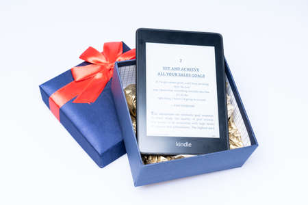 Kuala Lumpur, Malaysia - May 2021. Amazon Kindle Paperwhite 2019 is Amazon e-book reader that is lightweight and waterproofのeditorial素材