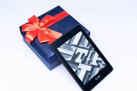 Kuala Lumpur, Malaysia - May 2021. Amazon Kindle Paperwhite 2019 is Amazon e-book reader that is lightweight and waterproofのeditorial素材