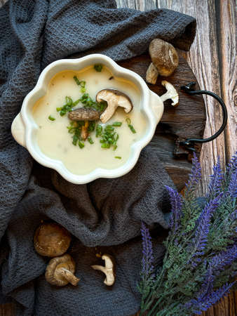 A bowl of mushroom soup. Vintage and rustic styleの写真素材