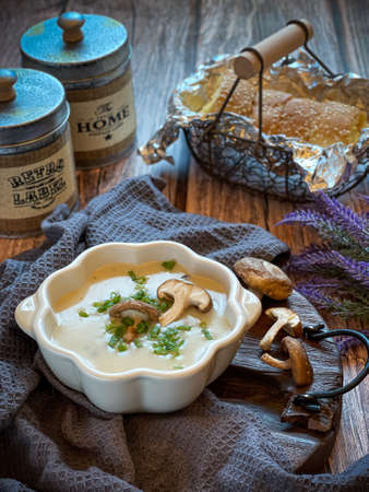 A bowl of mushroom soup. Vintage and rustic styleの写真素材
