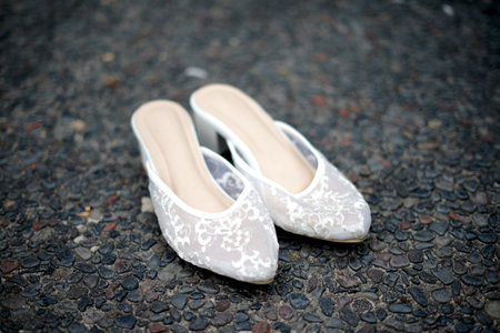 Wedding shoes on the pavement. Wedding shoes. Wedding shoes