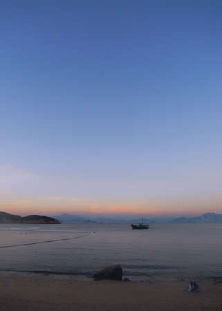 Sunset by the sea and beach in a holidayの写真素材
