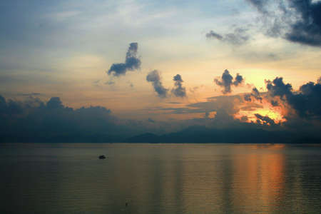 Sunset by the sea and beach in a holidayの写真素材