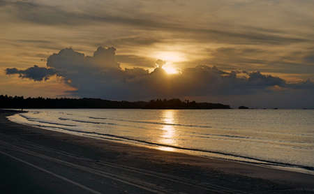 Sunset by the sea and beach in a holidayの写真素材