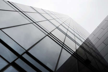 New architecture in western Europe made of glass, steel, stone and concrete, taken on a rainy day