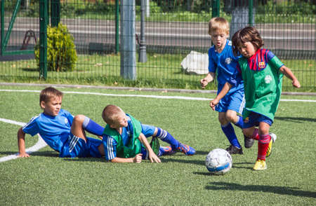 Small children play football のeditorial素材