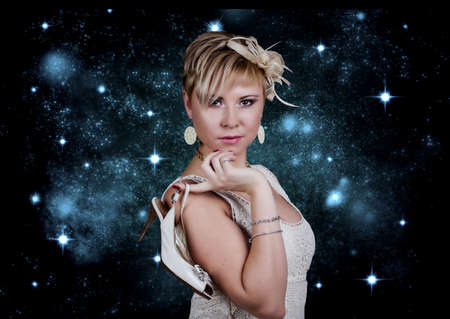 The woman against the star sky.の写真素材