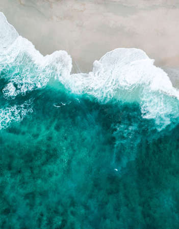 The soft beautiful sea rushes on the sandy beach. Backgroundの写真素材