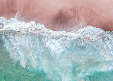 wave of ocean on sandy beach. Background.の写真素材