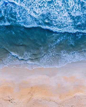 Wave of the sea on the sand beach