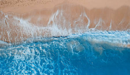 Wave of the sea on the sand beach