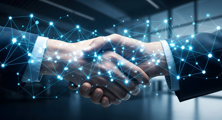 business handshake with digital network overlayの素材