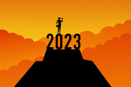 motivation in 2023. The man at the top of the mountain with the number 2023 is looking at the future. Standing proudly on the top of the hill, Achieving personal goals, victory conのイラスト素材