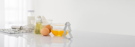 christmas Dessert ingredients and utensils on white reflect table background . Front view. Copy...
