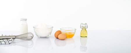 Set of kitchen utensils and ingredients for preparing bakery on light background. home cooking concept banner. white wall. Wide horizontal Panorama cover and header.Web Banner. Copy space.の写真素材