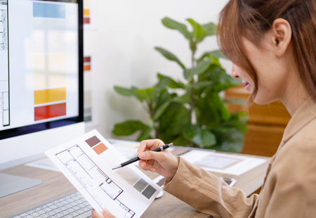 Professional interior designer working in the office, Portrait of young asian female architect...
