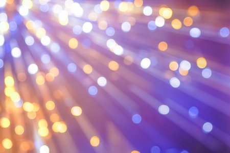 Purple and yellow bokeh abstract light backgrounds blur motion .の写真素材