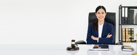 young female Lawyer or attorney working in the office, smiling and looking at camera.の写真素材