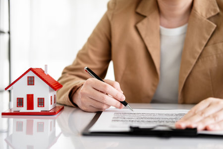 House model, employment contracts, real estate agents, and Real estate conceptの写真素材