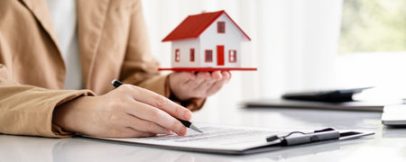 House model, employment contracts, real estate agents, and Real estate conceptの写真素材