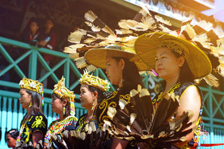 Tenggarong, Indonesia-August 27th,2016. Traditional dance of dayak people with traditional costume...