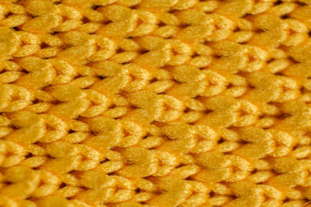 close up of yellow mesh fabric