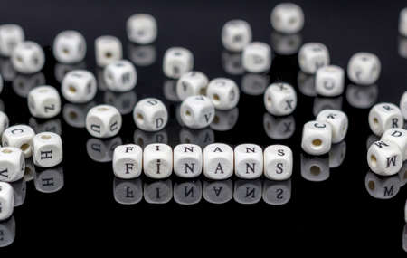 Finance (Turkish: Finance) on wooden cubes on blackの写真素材