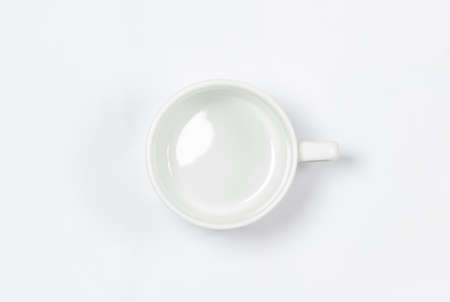 a white cup on a white backgroundの写真素材