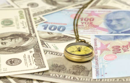 Management efficiency concept of pocket watch, Turkish lira and US dollar banknotesの写真素材