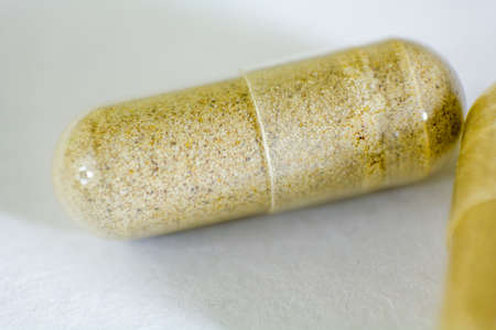 close up Herbal capsule isolated