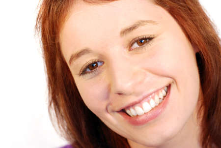 Shot of beautiful, smiling girl isloated on white background.の写真素材