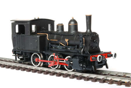 Vintage black model railway isolated on white backgroundの写真素材