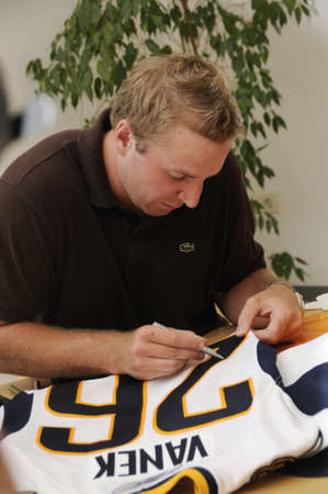 Zell am See, Austria - Jul 8. NHL star hockey player Thomas Vanek visits his hometown Zell am See in Austria on 8th July 2010, to speak to young players of Zell am See and giving autographs.のeditorial素材