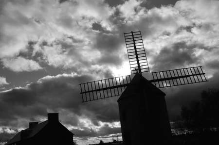 Weathercock of vintage wind mill in Brittany, Franceの写真素材