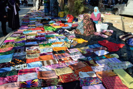 DJERBA, TUNISIA - JAN 23: People at typical traditional tunisian street market in Houmt Souk. January 23, 2010 in Djerba, Tunisia.のeditorial素材