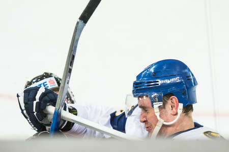 05.04.2013, Tiroler Wasserkraft Arena, Innsbruck, AUT, IIHF Testspiel, Oesterreich vs Kasachstan, im Bild Roland Kaspitz, (Team Austria, #8) gegen Yevgeniy Bumagin, (Team Kasachstan, #27) // during the preparation game of the IIHF Icehockey world championのeditorial素材
