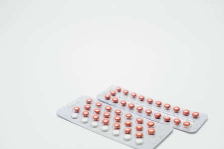 Contraceptive pills on white backgroundの写真素材