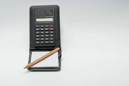 Pencil, notebook and calculatorの写真素材
