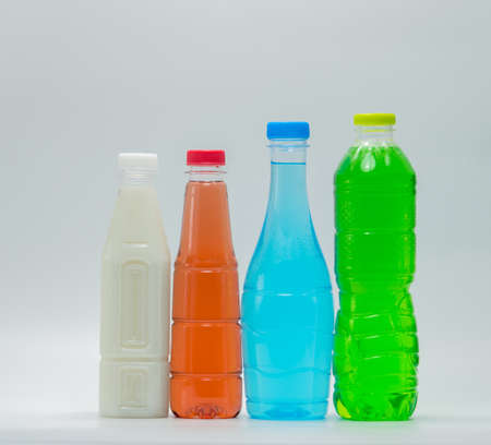 Modern design bottles of soft drink and soy milk on white backgroundの写真素材