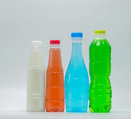 Modern design bottles of soft drink and soy milk on white background