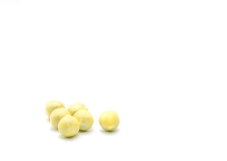 Chinese bolus herbal medicine is coated with yellow wax, isolated on white backgroundの写真素材
