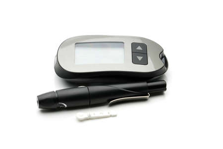 Medical equipment for measuring the level of blood glucose with lancing pen device on white...