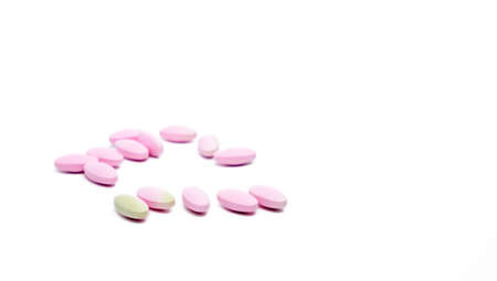 Expired calcium tablet pills with color change isolated on white background with copy spaceの写真素材