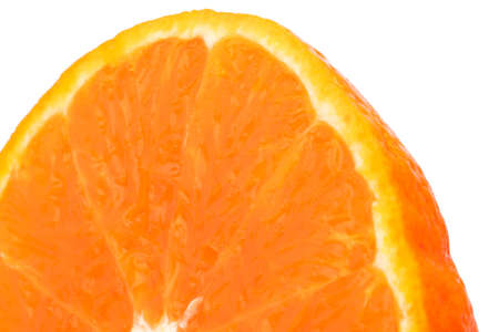 Half of fresh juicy orange fruit slice isolated on white background with copy space for text. Natural vitamin C antioxidant concept.の写真素材