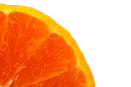 A quarter of fresh juicy orange fruit slice isolated on white background with copy space for text. Natural vitamin C antioxidant concept.の写真素材