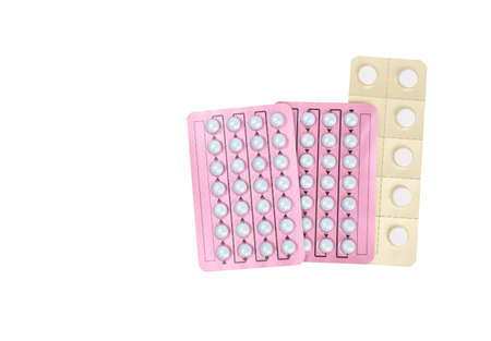 Hormone pills for treatment menopausal woman on white background with copy space. Hormone replacement therapy concept.の写真素材