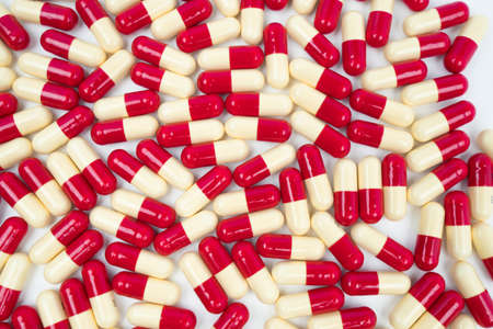 Colorful of antibiotic capsules pills isolated on white background, drug resistance conceptの写真素材