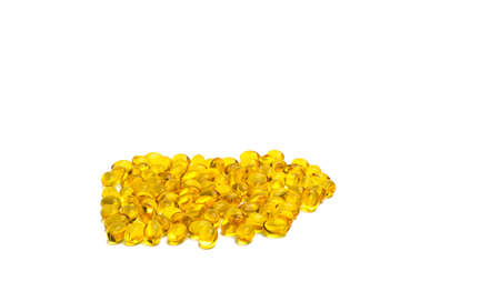 Pile of cod liver oil isolated on white background. Source of Omega-3 and vitamin A & D helps growth development and absorption of calcium and phosphorous in the bodyの写真素材